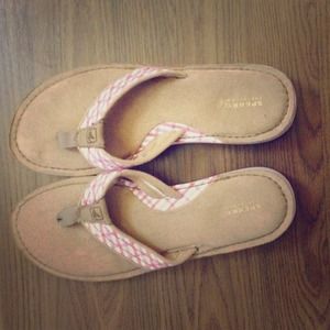 Pink and brown flip flops