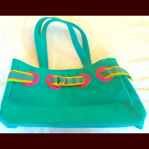 Very cute teal color handbag