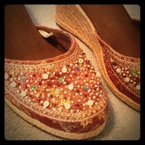 Size 10 slide shoes, worn once.