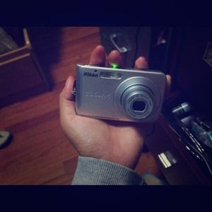 Gray Nikon coolpix camera