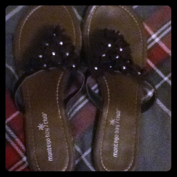 Black flower flip flops