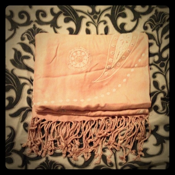 Pale pink scarf with white design