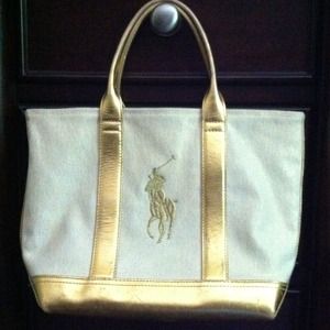 Canvas and gold leather handbag