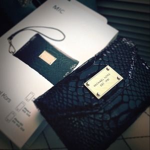 Kors black iPhone wristlet