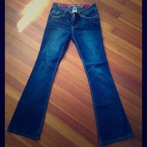 Rear button pocket blue jeans