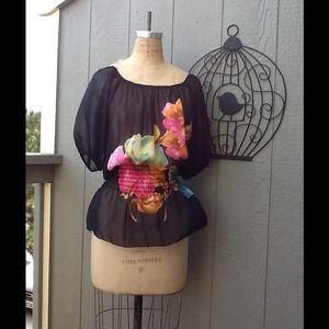 Sheer black blouse with bold flower print