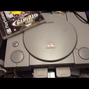 PS WITH 2 CONTROLLERS AND 8 GAMES