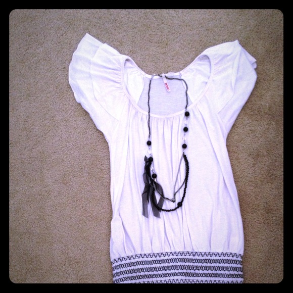 White top with necklace attached