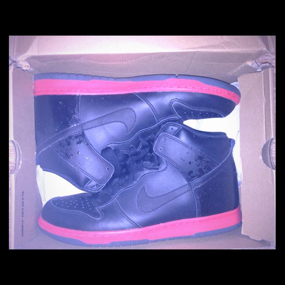 Black and red Nike high tops. Mens