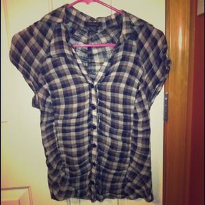 Black and white checkered plaid button up top.