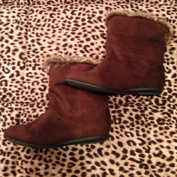Brown boots with fur interior.
