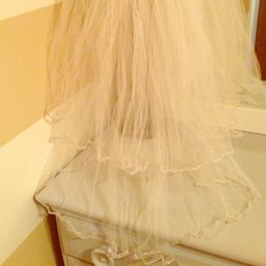 Double layer bridal veil. Beaded edges. Worn once.
