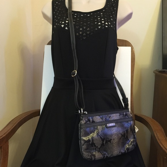 Relic clutch/sling bag