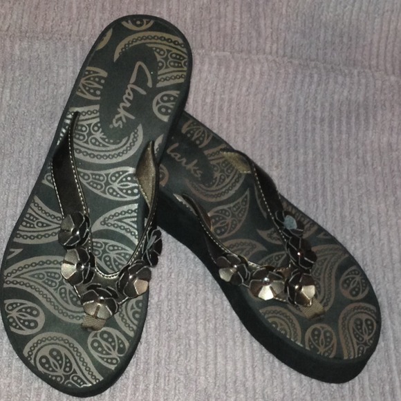 SOLD CLARKs bronze flip flop sandals