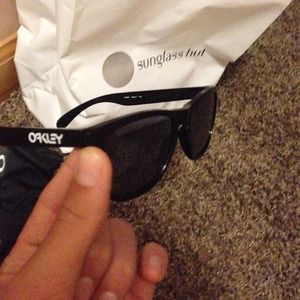 Black Men's Oakley sunglasses.