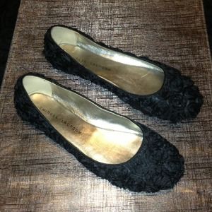 Black rosette flats by Chinese Laundry