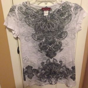 Cute bling shirt. Never worn. X-L but fits Med