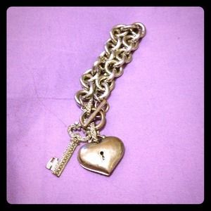 A Silver Bracelet (Not Gold)