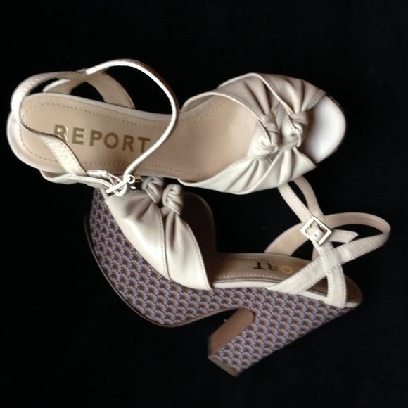 REPORT HEELS