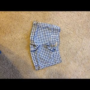 Plaid shorts.