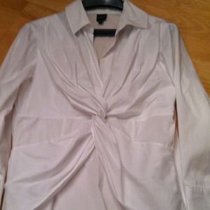 Size 10 white long sleeve blouse. Side zipper.