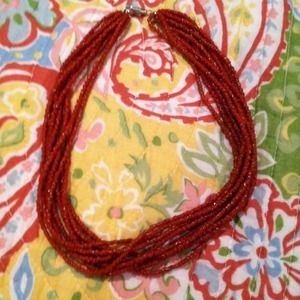 Orange coral necklace and matching earrings