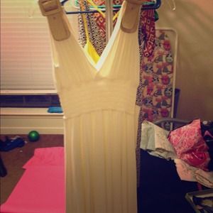 Ivory dress with gold leather buckles
