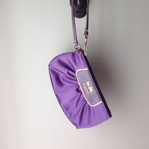 Authentic Coach satin wristlet.