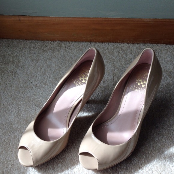 Nude patent pumps.