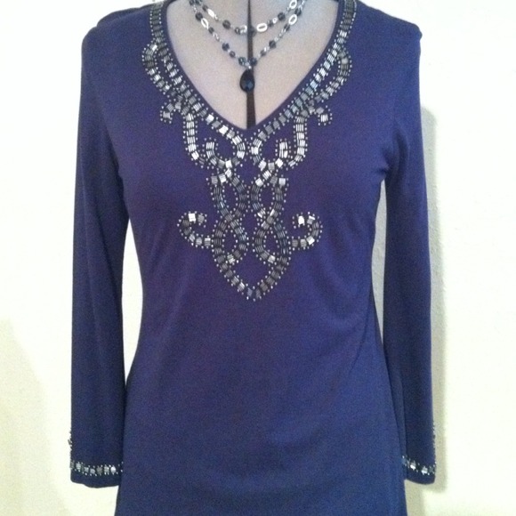 SOLD in bundle. Bead embellished top.