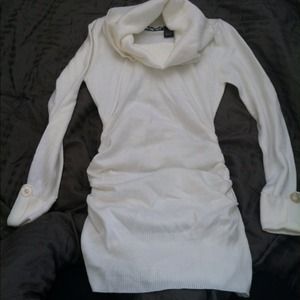 Brand new. Long, cowl neck, rouched side sweater