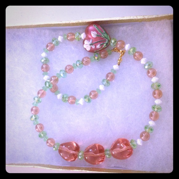 Unique necklace. Great present for a little one!