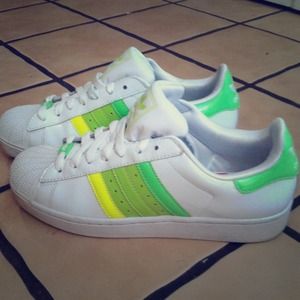 Bundle of green Adidas an black nikes