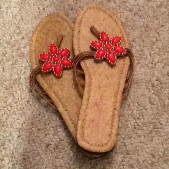 Pink beaded flower flip flops