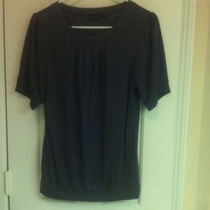 The limited gray top