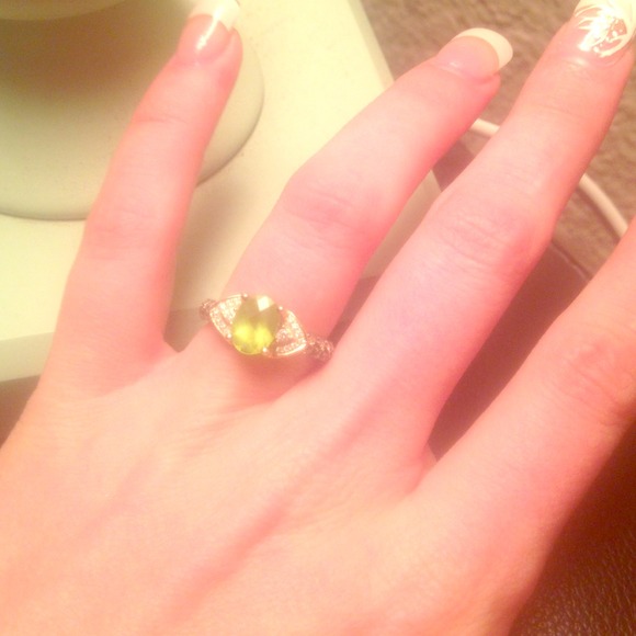 Real Gold ring with white and chocolate diamonds.