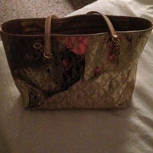 Gold shiny  Authentic Michael Kors bag- hold