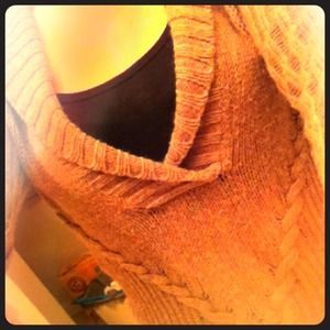 Brown/tan sweater.