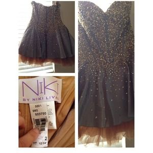 Short baby doll dress with sequins.