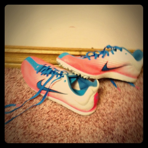 Worn to one track meet, awesome condition.