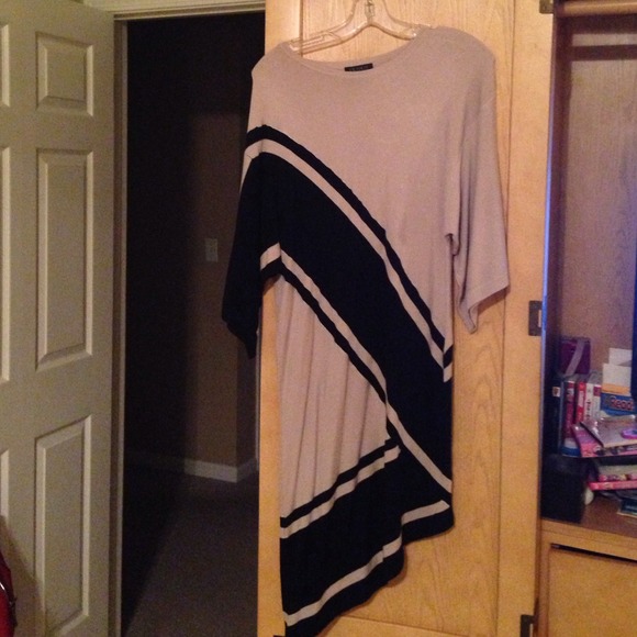 Asymmetrical dress.