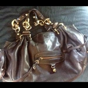 Juicy Couture brownish/purple leather handbag!