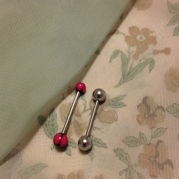 Two sanitized tongue rings