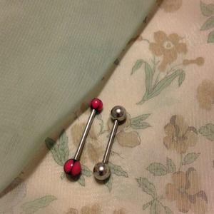 Two sanitized tongue rings