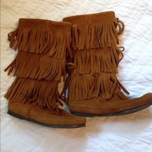 Minnetonka calf fringe boots.