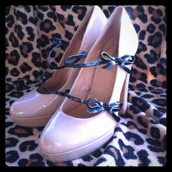 Tan heels, with black bows
