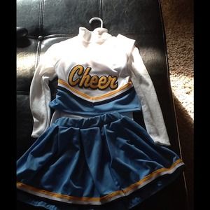 Cheerleader costume with Pom pom. Wore once.