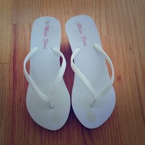 White platform flip flops