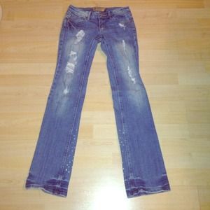 Light blue ripped jeans