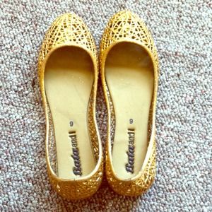 Glittery flats.